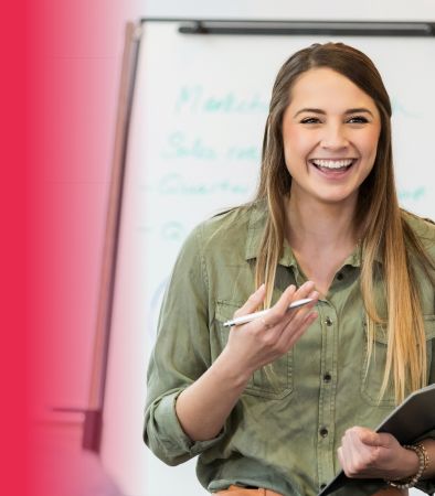 Lady laughing with clipboard