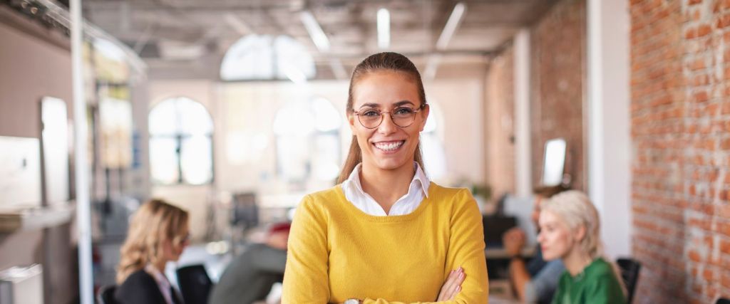 Lady in yellow jumper smiling