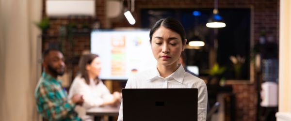 Focused employee on laptop
